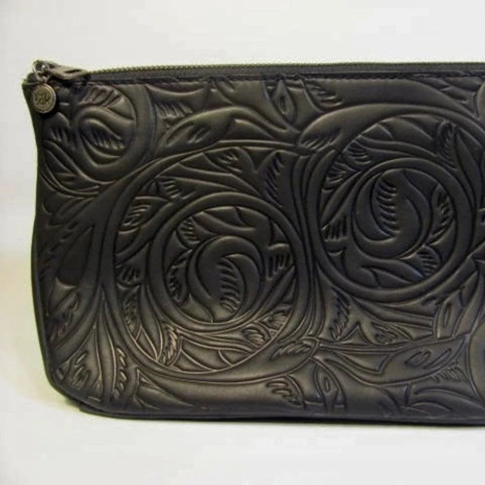 The Sak Cosmetic Clutch Embossed Black Like New